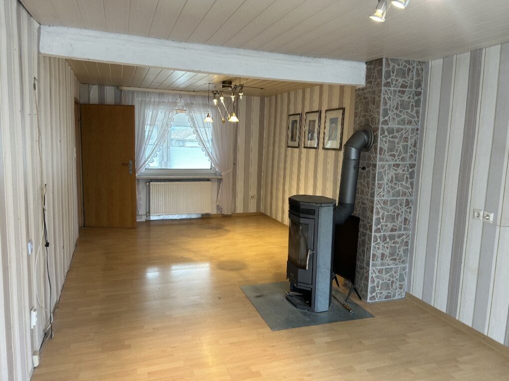 Wohnzimmer mit Kamin