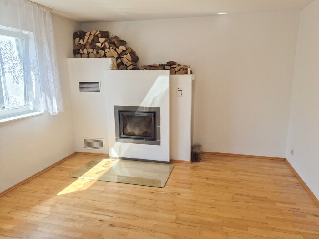 Wohnbereich mit Kamin (OG)