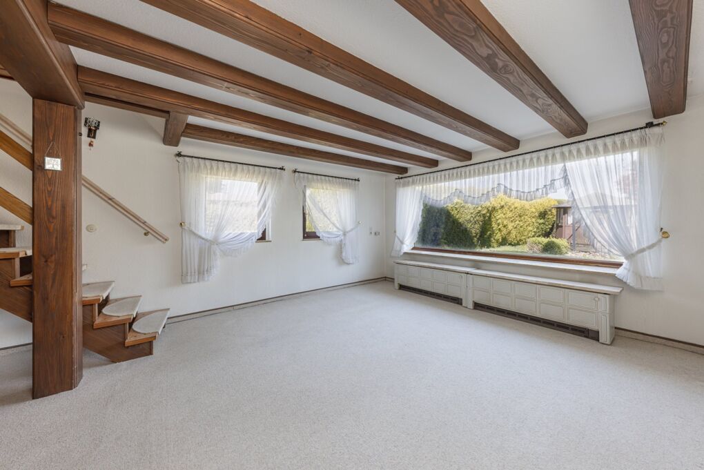 Wohnzimmer mit Grünblick